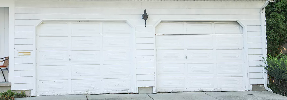 Roller Garage Door Dropped Down Replacement in Country Club, FL